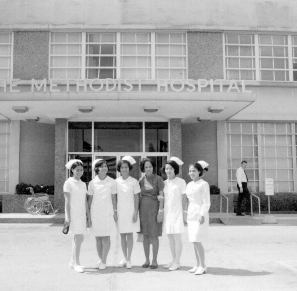 A group of nurses standing outside of Methodist Hospital in Houston.