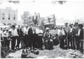 An image of Texas rangers with a confiscated still.