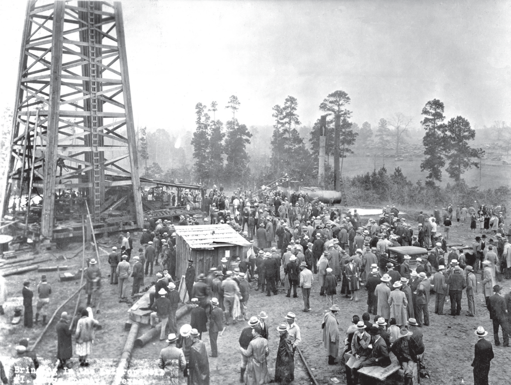 An image of a crowd at an oil well in Southeast Texas.