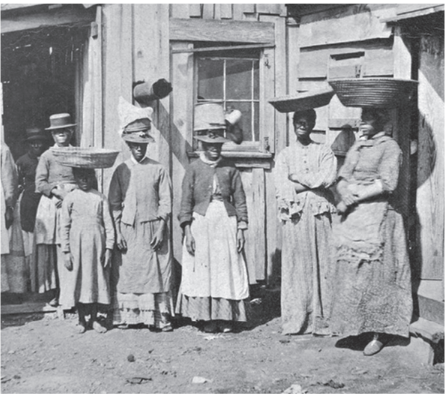 An image of a group of Gullah Geechee women at a market.