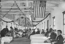 A photo of civil war era patients in beds at the Carver Hospital in Washington, DC