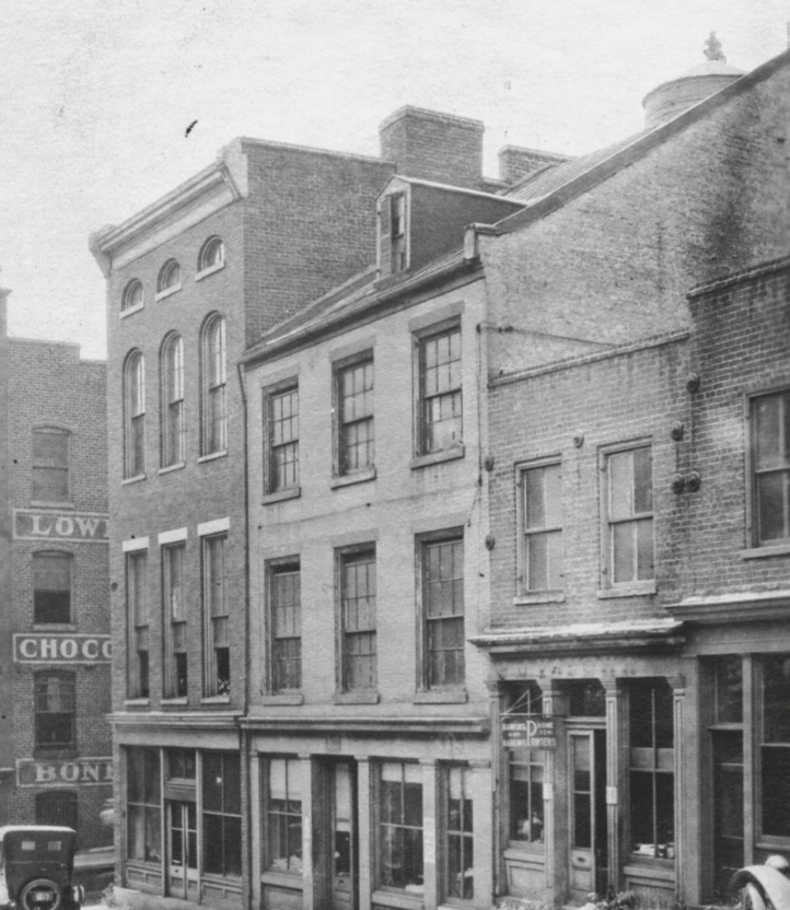 A black and white street view of Poe's apartment on Fourteenth Street and Tobacco Alley