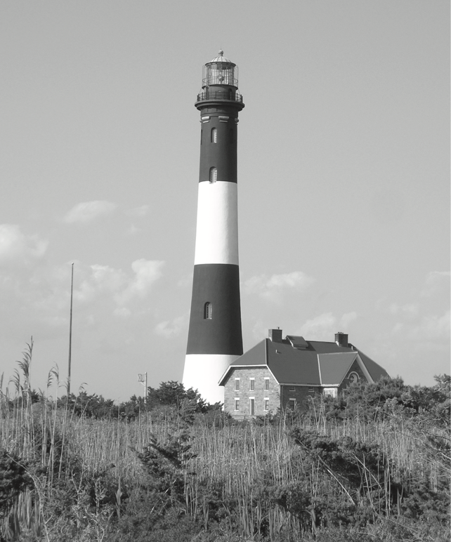 A black and white photo of the Fire Island Lighthouse