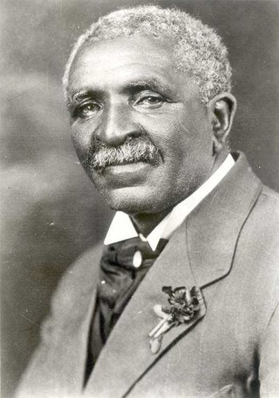 Portrait of George Washington Carver sporting a suit