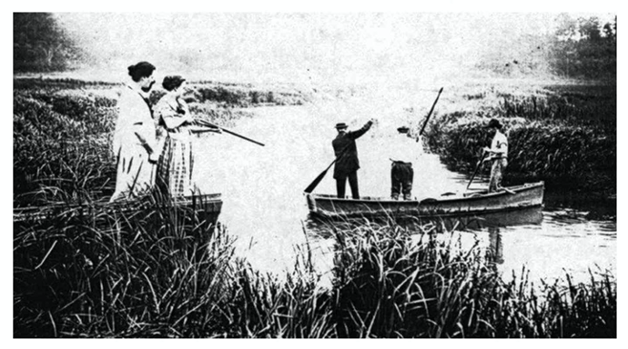 A photo of three men in a boat on the creek searching for the lost child while two women, one holding a shotgun, stand by the dock observing.