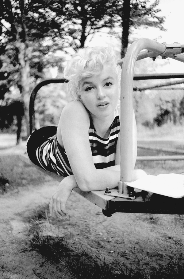 Marilyn Monroe posing on a playground